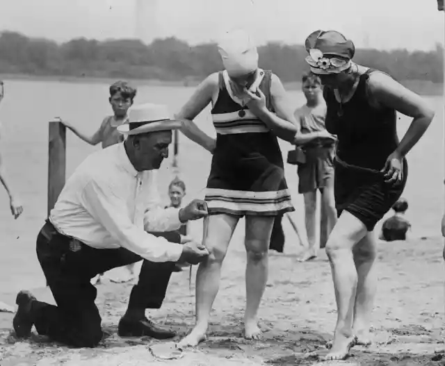 Inspecting women’s swimsuits- 1920s