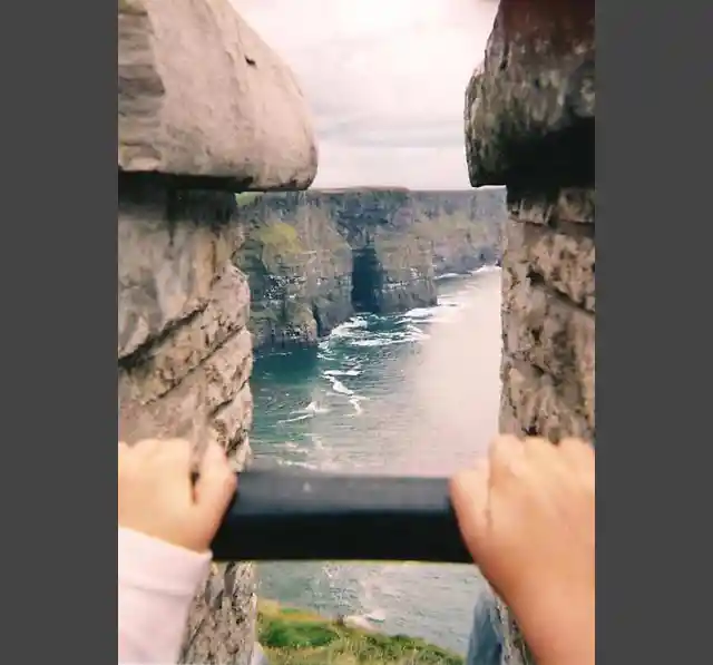 Holding a Pseudo-photograph Cliffs of Moher