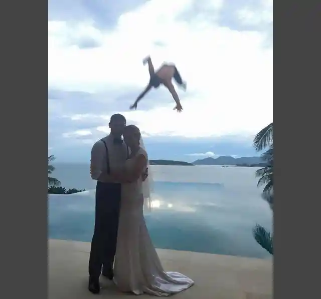 Mid-Air Struggle Behind The Newly Wed.