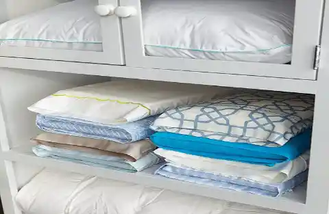 Use a Dryer Sheet to Keep Your Linens Fresh