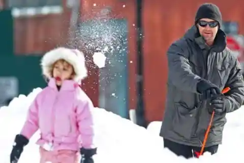 Hugh Jackman Chucks Snowball At Daughter.