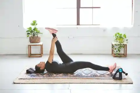 From Knee to Opposite Shoulder Stretch