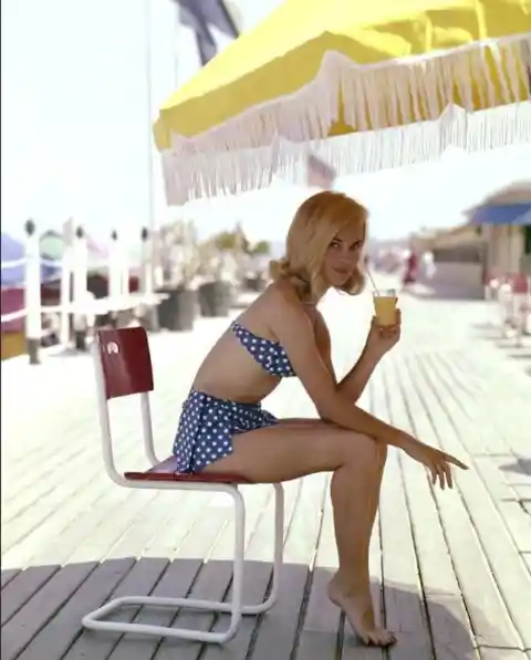 Getting some shade- France, 1955