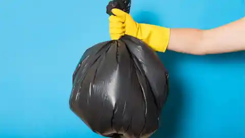 Woman Notices Trash Bag On Road, Follows Her Instincts And Opens It Up