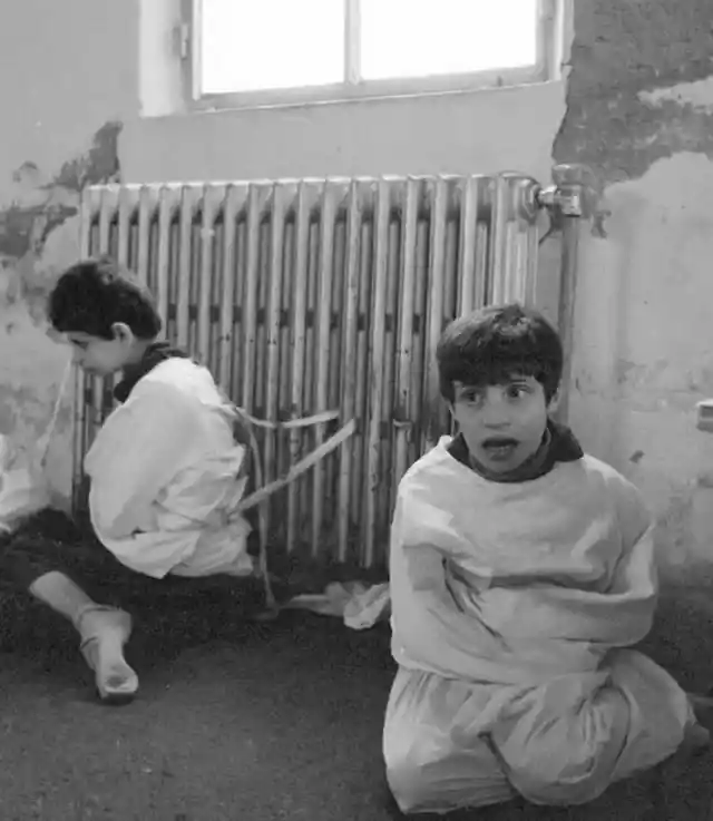 Two autistic children tied to a radiator, Lebanon, 1982