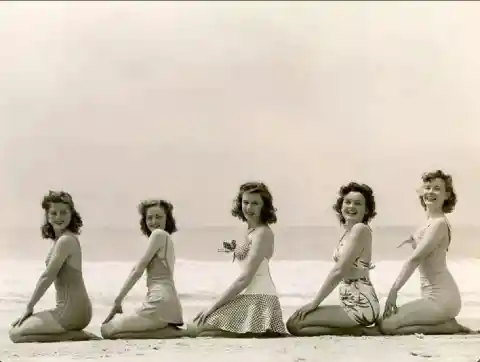 1950s photo of friends posing on the beach